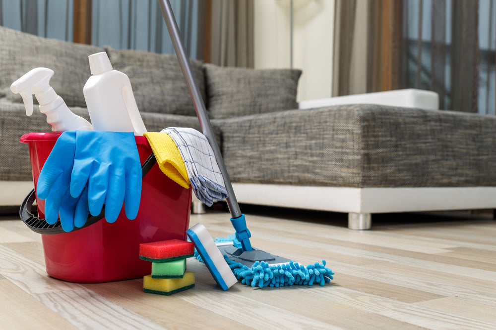 Bucket with sponges, chemicals bottles and mopping stick. - Mop Hardwood Floors
