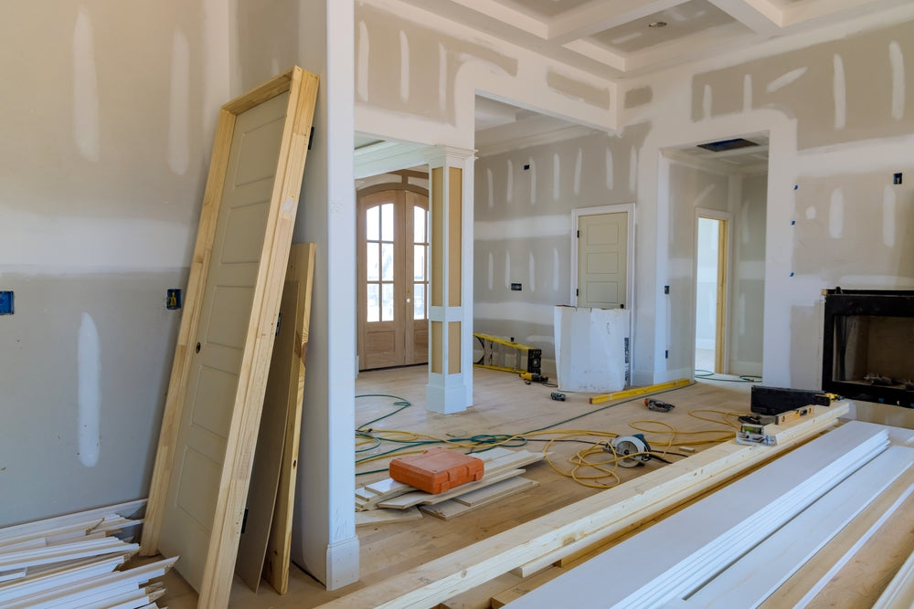 New house under construction with on stacker wooden material door molding trim